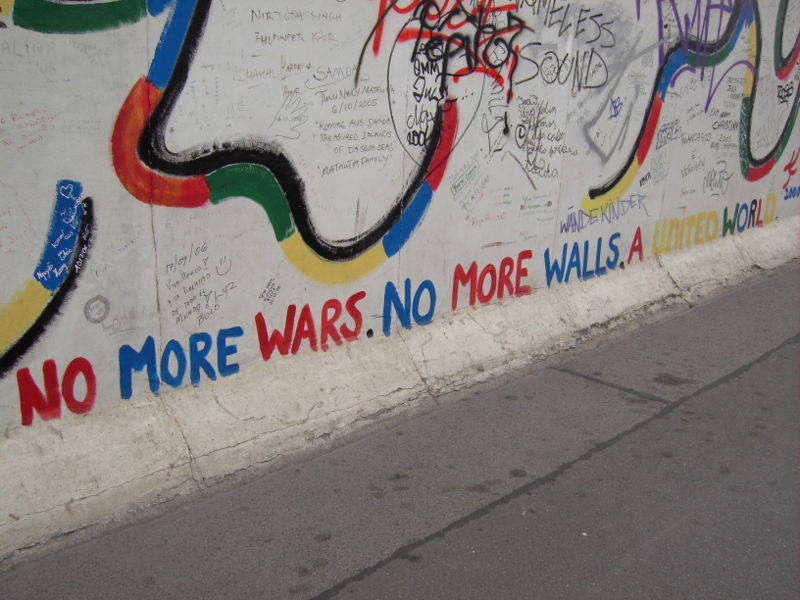 A popular slogan graffitied on one of the sections of the East Side Gallery, reading: "No more wars. No more walls. A united world."