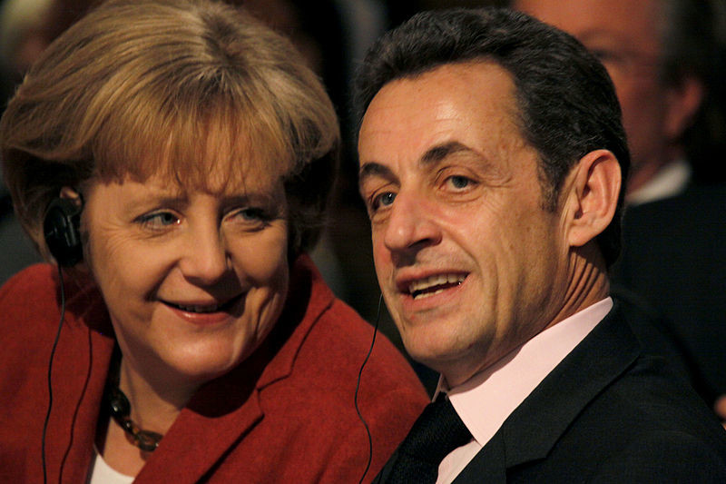 English: 45th Munich Security Conference 2009: Dr. Angela Merkel (le), Federal Chancellor, Germany, in Conversation with Nicolas Sarkozy (ri), President, French Republic. 7 febbraio 2009, 21:22
