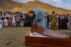 A funeral for Zemari Ahmadi, one of the victims of the drone strike. Photo by MARCUS YAM/LOS ANGELES TIMES/Shutterstock