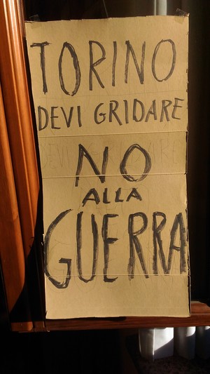 Il cartello di Enrico Peyretti